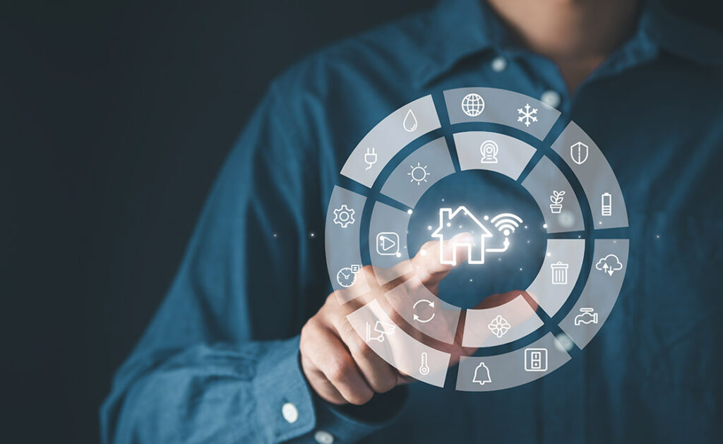 Man holding a virtual home icon on his finger, representing smart home technology and features.